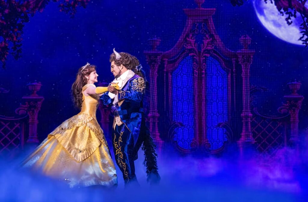 Luxury black car arriving for Broadway show transportation in NYC